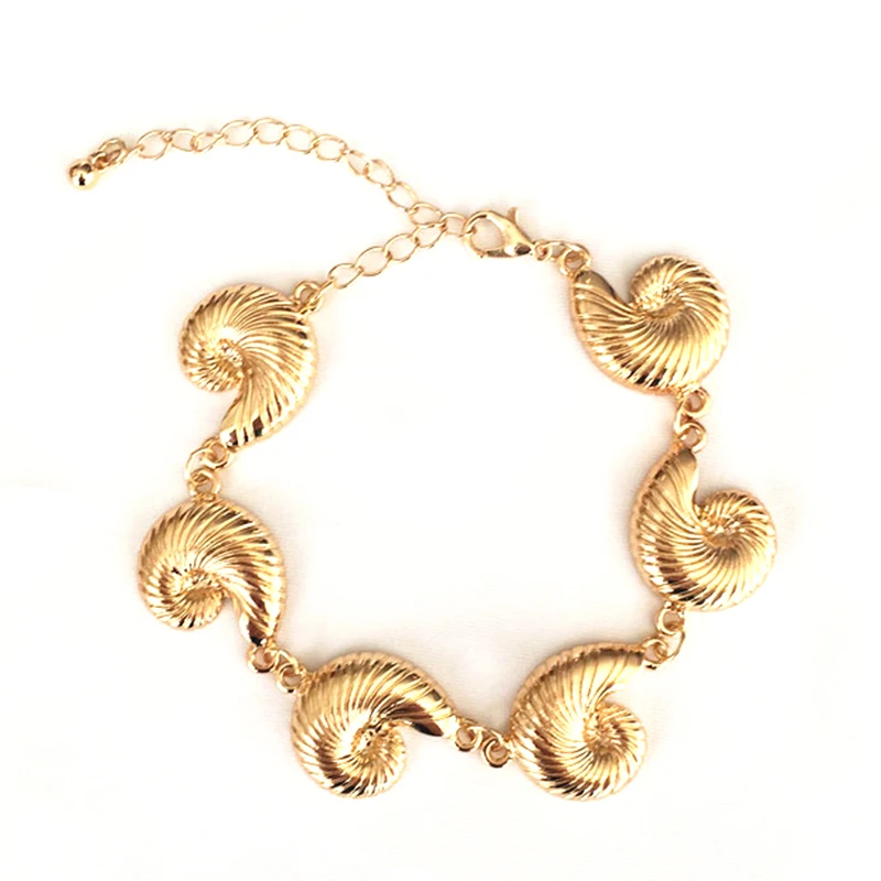 

SRCOI Delicate Gold Color Metal Cowrie Shell Charm Bracelet Handmade Bohemia Holiday Jewelry Sea Snail Bracelet For Women Girls