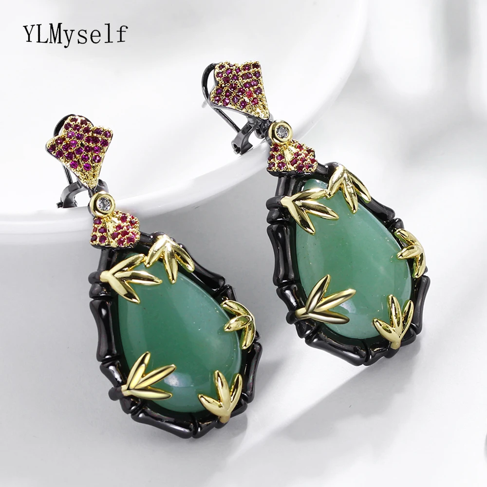 

Boutique Jewelry Earrings Pave with Big green stones and Red Cubic Zirconia in Black Large Bamboo Water Drop Earrings