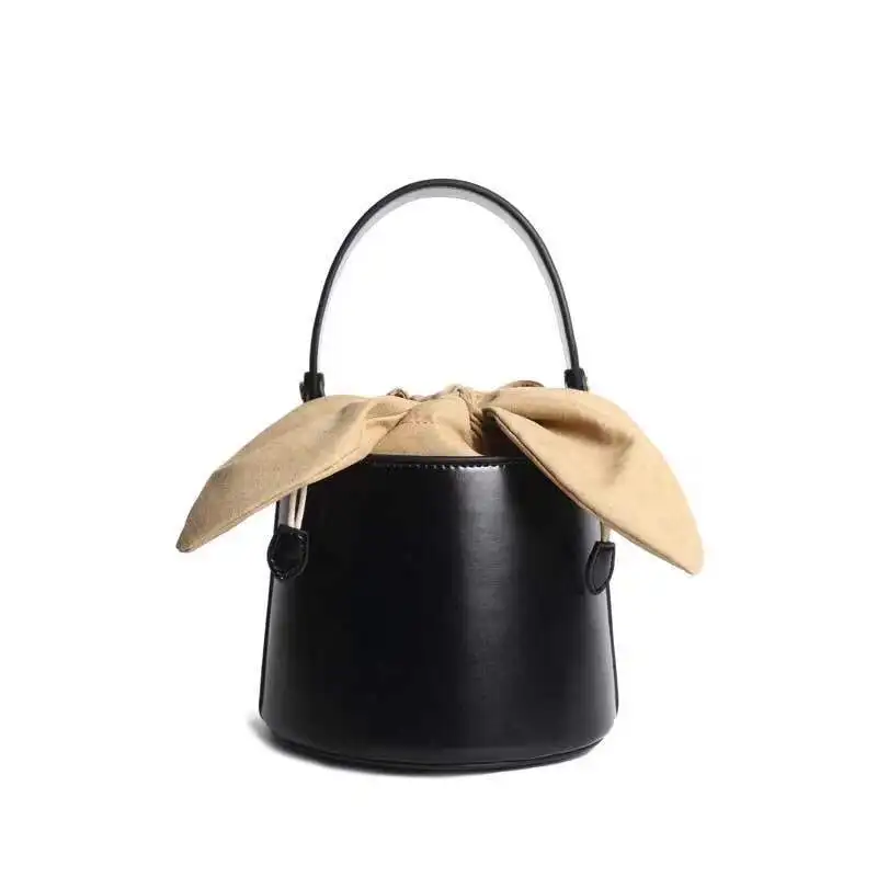 

New Female Bag Rabbit Ears Bow Cowhide Bucket Bag Little Public Fashion Retro Shoulder Slant Slant Leather 2019 Female Bag