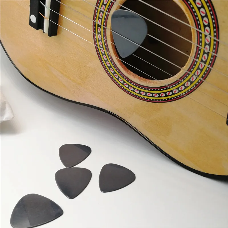 Caparison guitars apple horn 8. Гитара на камне. Гитара на камне. Гитара бен. Кошачий глаз сердечко.