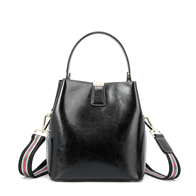 

Simple high quality oil wax leather soft face women's bag lock buckle opening closing bucket design women leather handbags