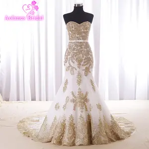 white and gold wedding dress