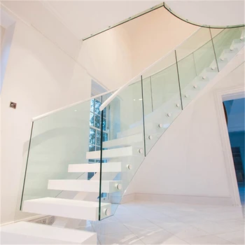 

uk center beam open riser staircases with frameless glass balustrade
