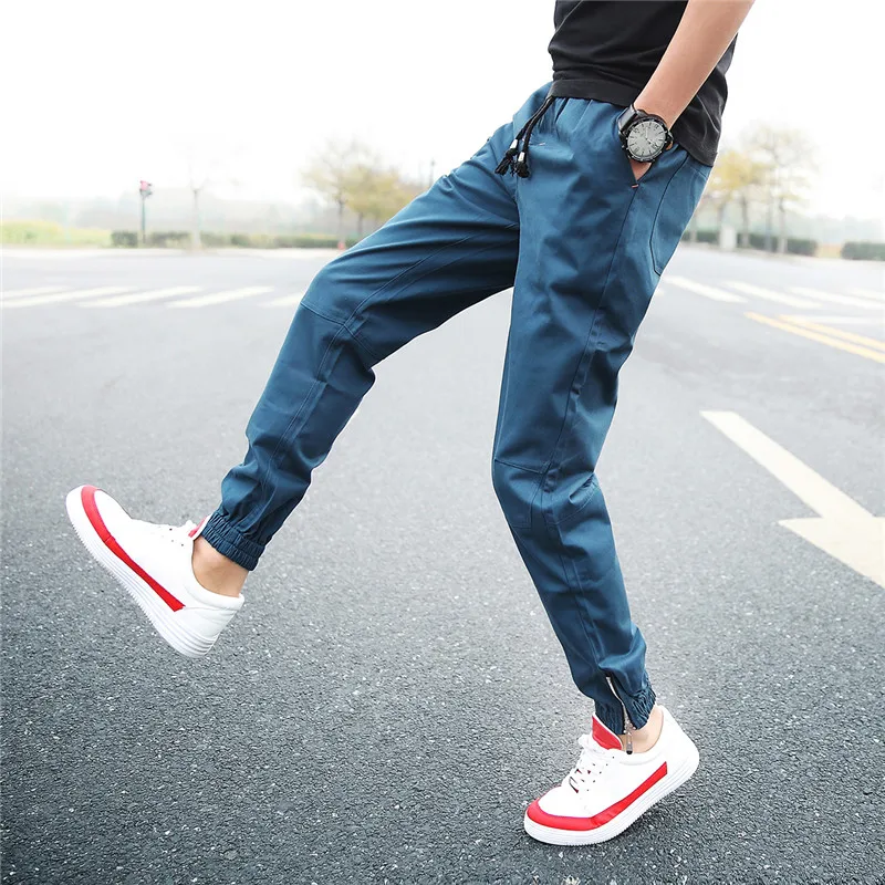 

New men's casual sports trousers, stylish slim elastic band harem pants, personalized zipper decoration large size nine pants