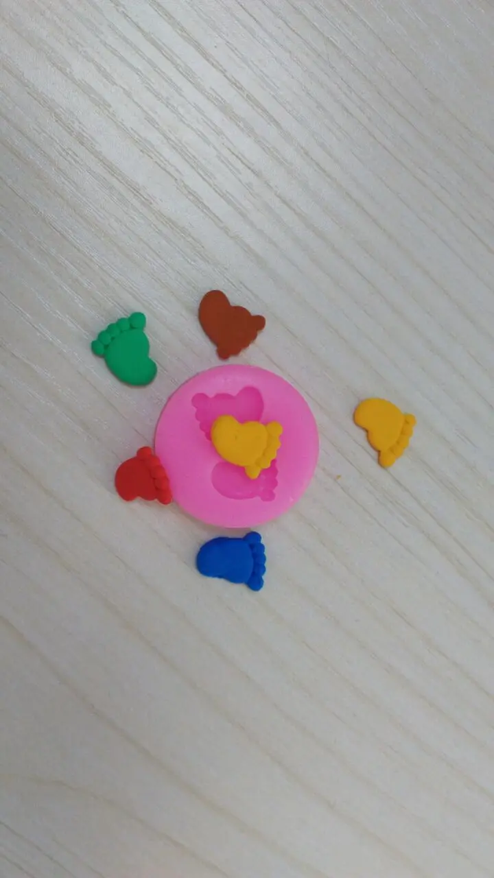 

Very Very Tinny Feet Silicone Rubber Food Grade Flexible Mold- resin, wax, soap, clay, butter pat, chocolate, fondant, candy