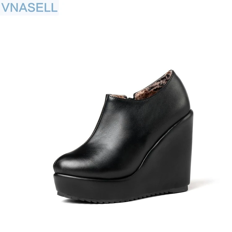 

The thick bottom Martin boots female 2018 new style autumn winter slope follows the short boots round head female