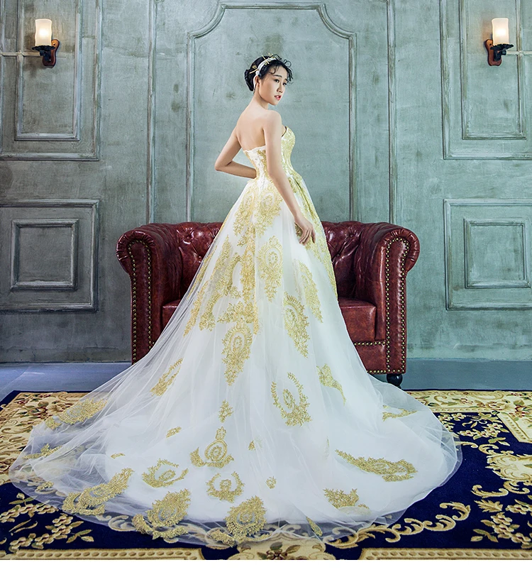 white and gold indian wedding dress