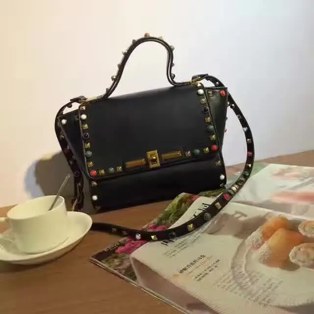 

Color rivet bag genuine leather diagonal cross Handbag Bag female autumn winter new dumpling bag Bat Bag