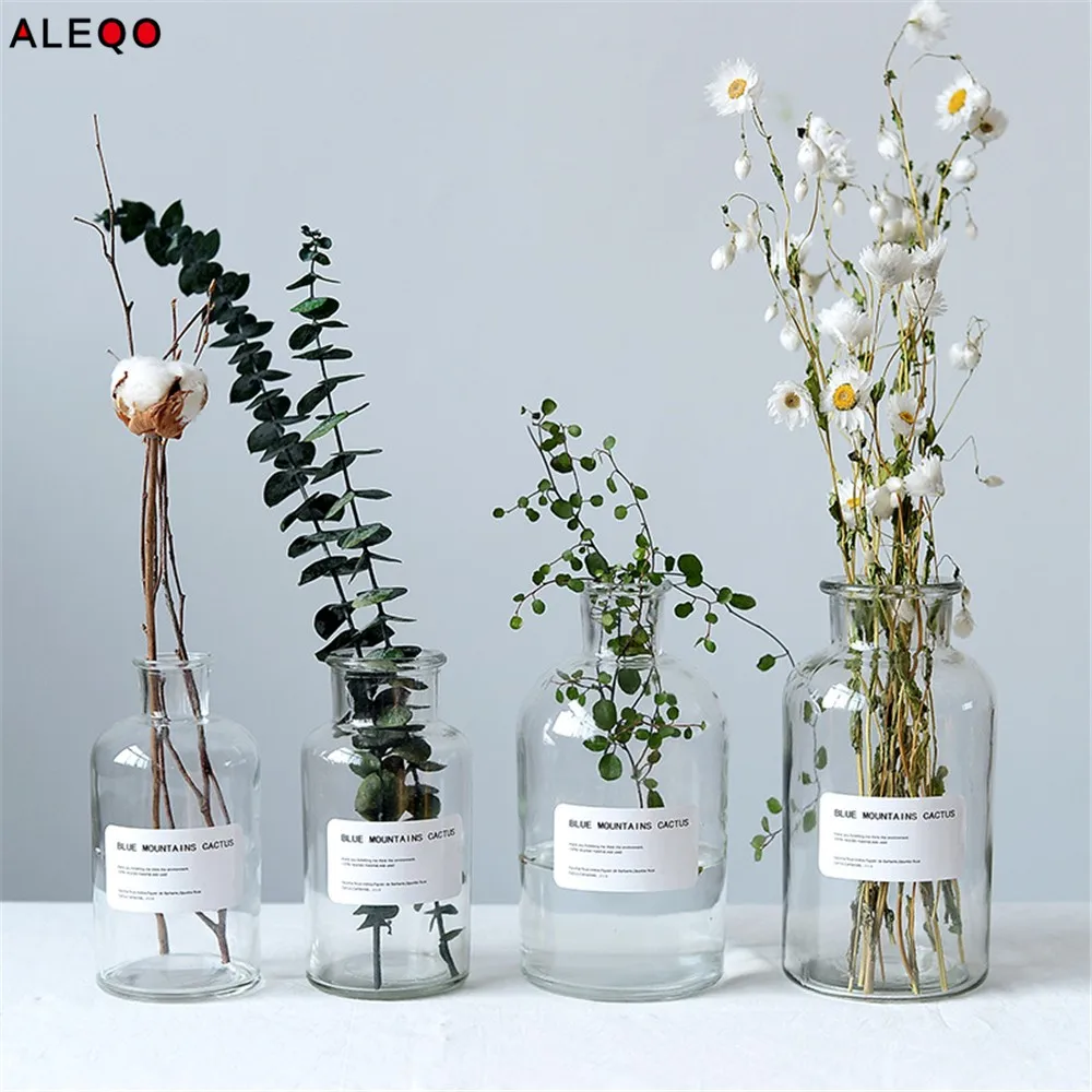 

Minimalist Chic Glass Storage Jars Scandinavian Vogue Elegance Transparent Desk Storage Bottle Organizer Flower Container Decor