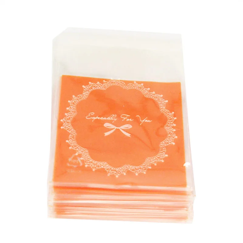 100 шт 7 см OPP милый лук дизайн печенья Свадебная подарочная упаковка сумки Рождественская вечеринка печенье конфеты самостоятельно клейкий пластиковый пакет - Цвет: Orange
