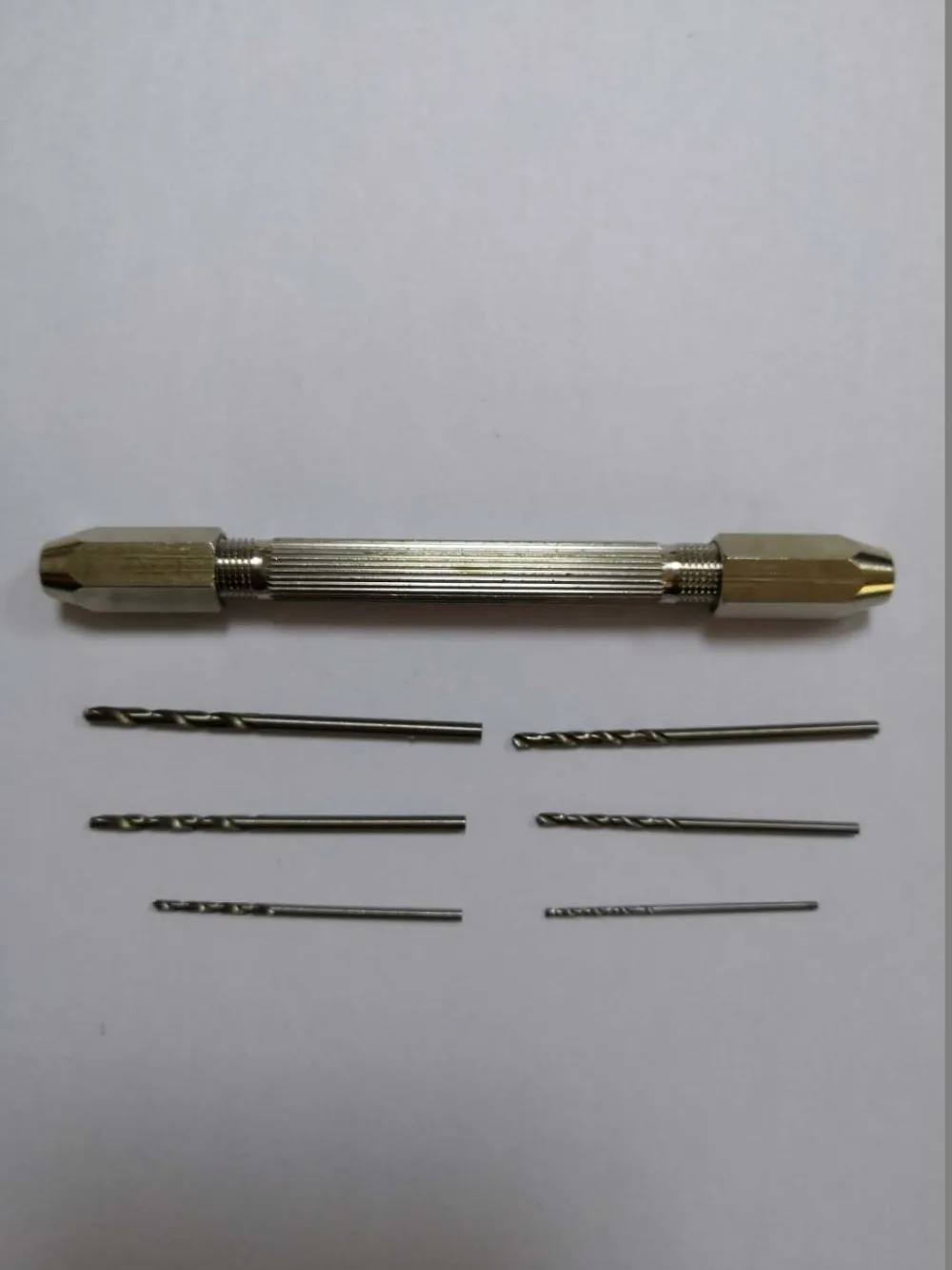 

Pin Vise 117661 With 2 sets of Graco Glascraft Probler P2 Spray Gun Drill Bits