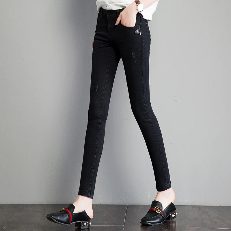 black jeans with zippers on legs
