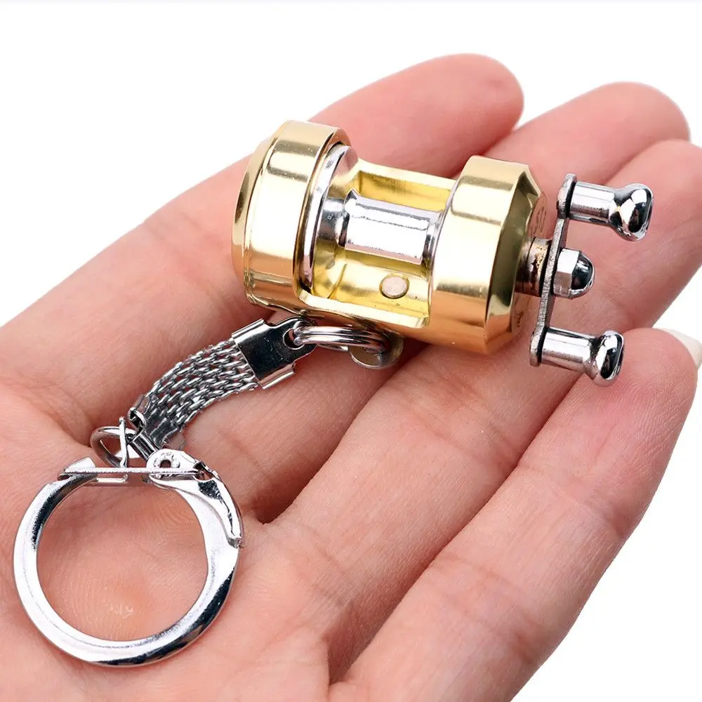 

High Quality 1 Pc Gold Color Metal Fly Reel Key Chain Creative Travel Pocket Trolling Fishing Fly Reel Keychain Jewelry