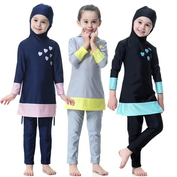 

Two Piece New Girls Solid Muslim Swimwear Two-piece Swimsuits Girls Long Sleeve Swimwear Islamic Children Bathing Suit With Caps