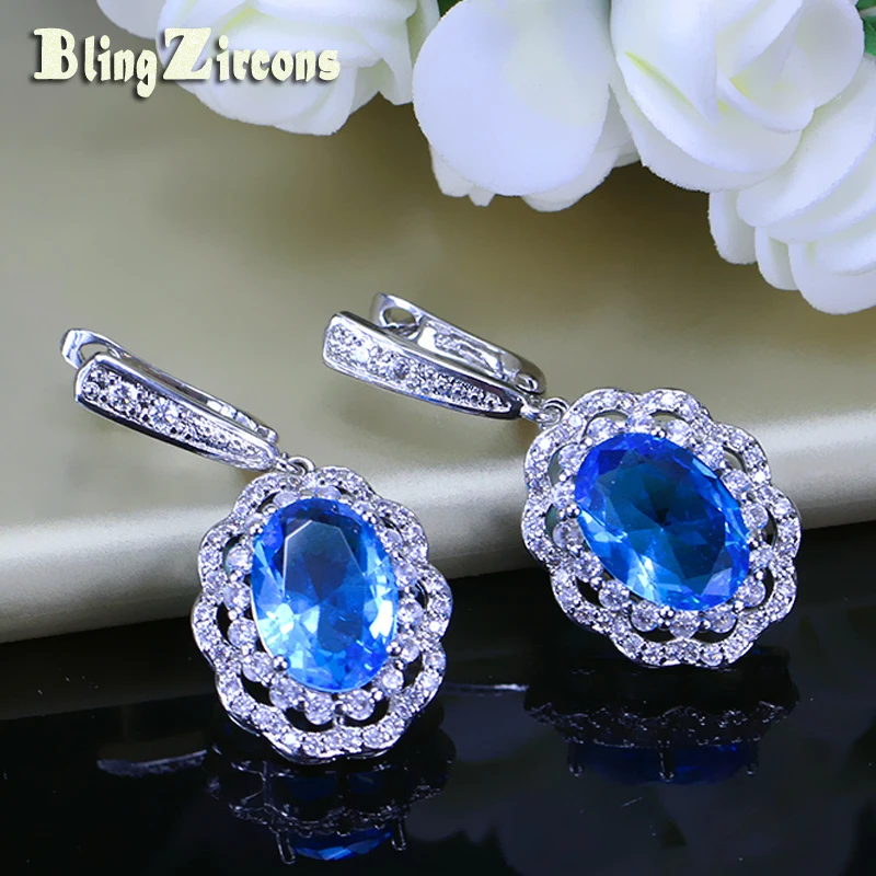 

BlingZircons Fashion Big Austria Crystal 925 Silver Jewelry Flower Drop Light Blue Oval Stone Setting CZ Earrings For Women E118