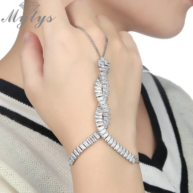 

Mytys Gorgeous Cubic Zircon Charm Hand Palm Bracelet for Women Unique Slave Bracelet Link Finger Cuff Jewelry Handlets R2094