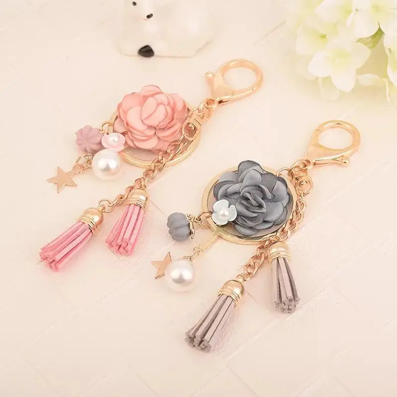 

New creative cloth flower pearl pendant small tassel key holder female bag pendant key chains flower car key ring keychain