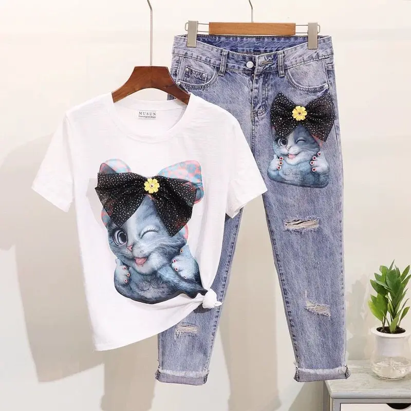 

HAMALIEL High Quality Summer Jean Pants Suits 2019 Women Diamonds Kitty Cartoon Pattern Bow TShirt + Casual Tassel Hole 2PCS Set