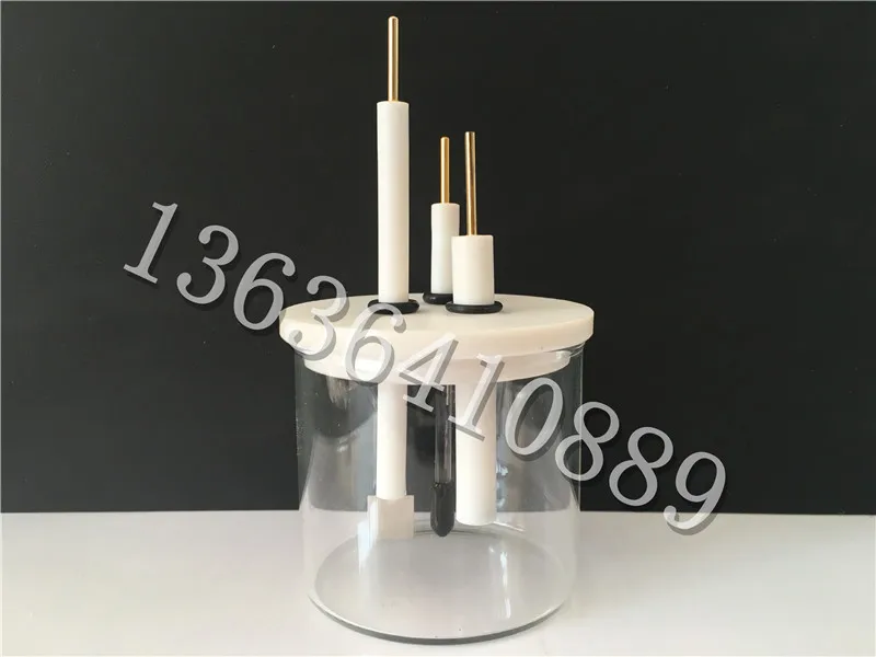 Non sealed three electrode electrochemical glass electrolyzer for