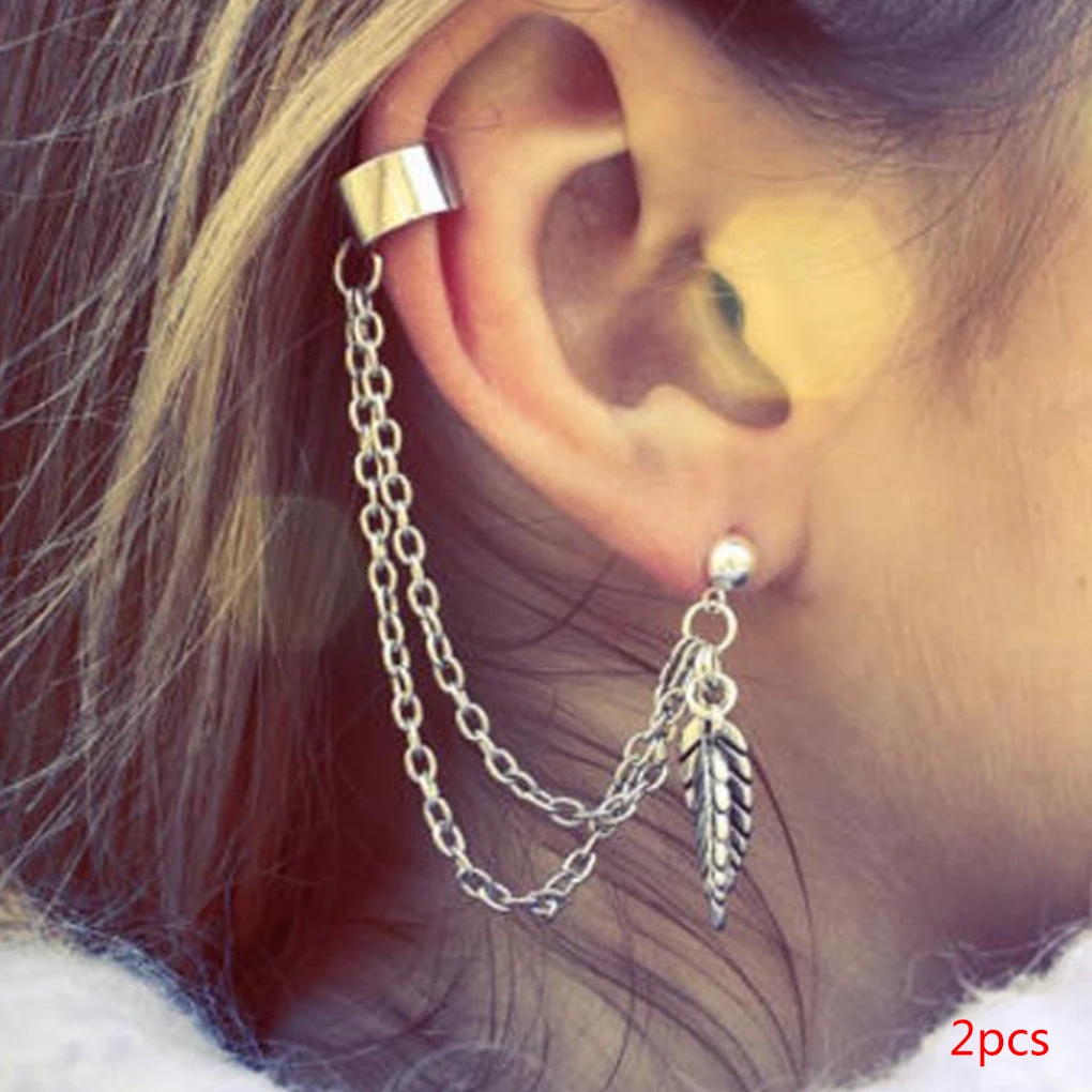 Серьги с цепочкой на хрящ. Сережки на хрящ с цепочкой. Прокол хеликс с цепочкой. Серьга крест каффа. Серьги на две дырки.