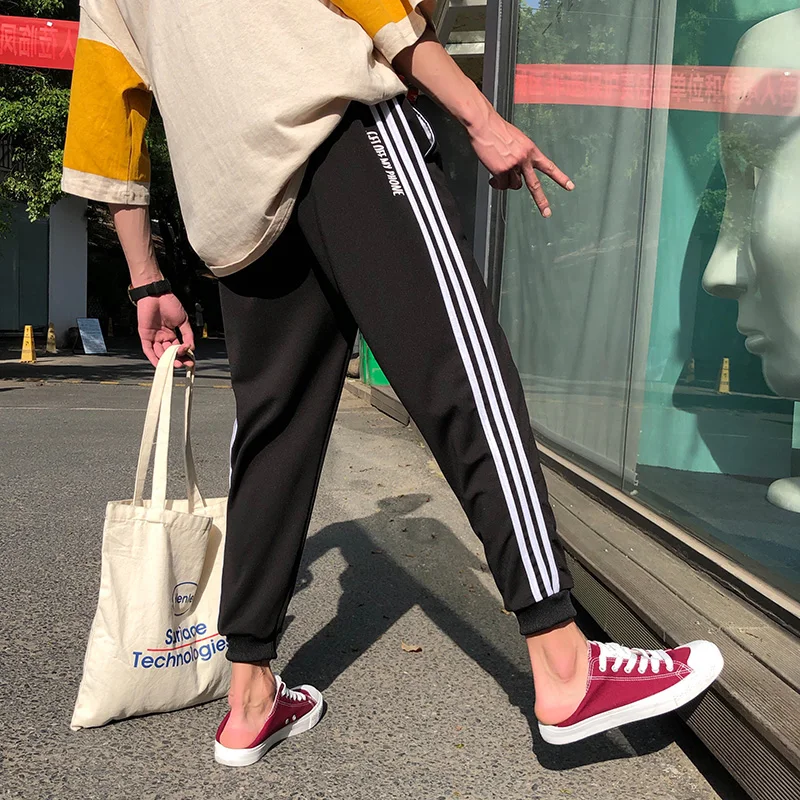 

2019 new men's casual sweatpants loose nine pants large size S-4XL pants side seam stripes mid-rise micro-elastic feet pants