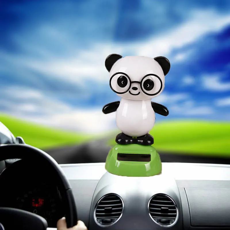 Car dashboard doll ornaments ABS material creative solar fashion car