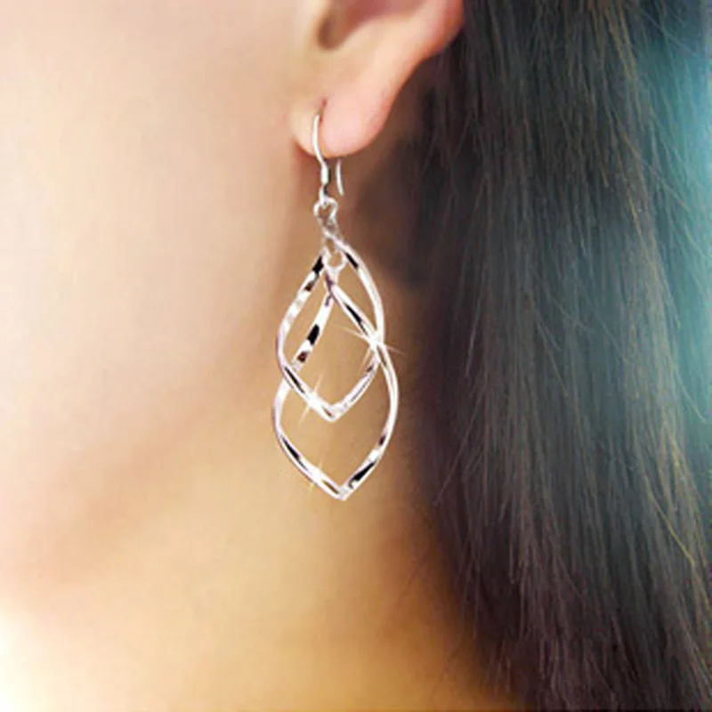Women Hollow Leaves Earrings Long Tassel Drop Dangle Earring Charm Jewelry F3 