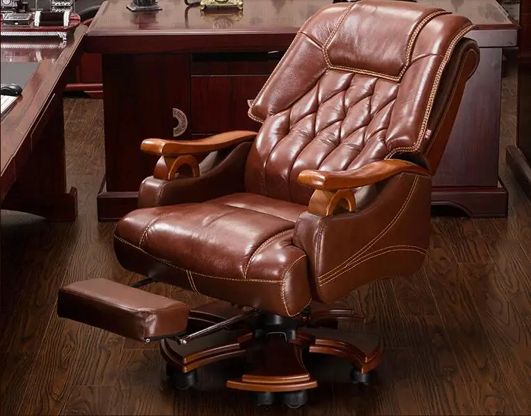 Настоящее кожаное кресло начальника. Массаж может лежать офисное кресло. 012