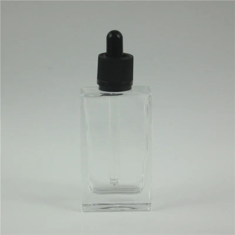 

Fast Shipping 50pcs/lot 50ml Square Clear Glass Essential Oil Bottle With Dropper 1OZ Essential Oil Container Perfume Bottle
