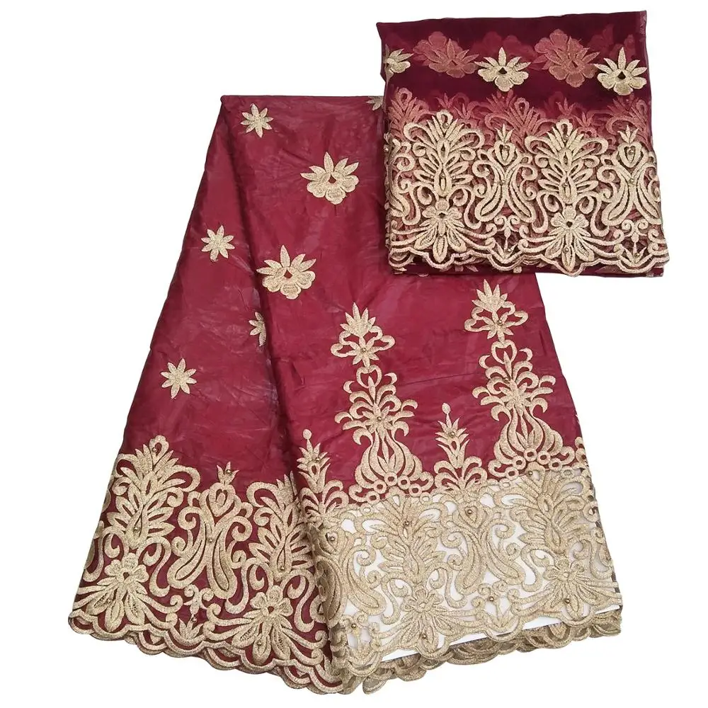 

Wine red African bazin riche getzner with net lace and french lace high quality available in purple brown nigerian lace fabrics