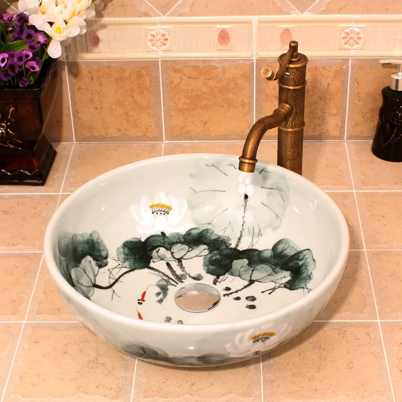 

Oriental hand painted lotus fish design ceramic porcelain bathroom ceramic basin