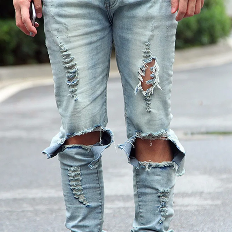 black jeans with big knee holes