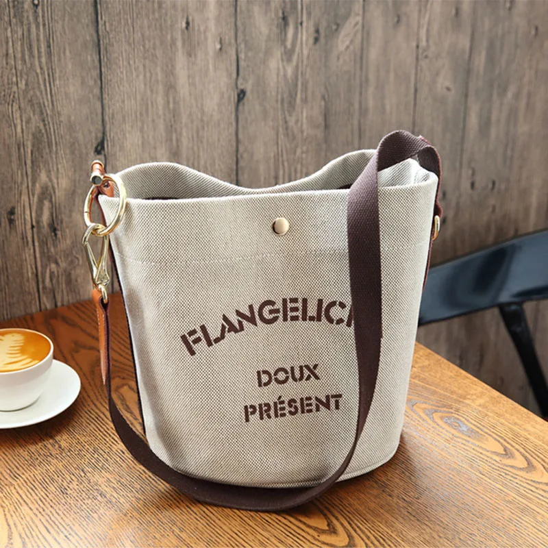 

Canvas shoulder bag women 2019 new letters campus students Messenger bag girls fashion bucket bag designer leisure