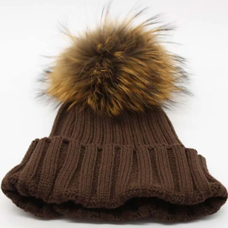 brown pom pom hat