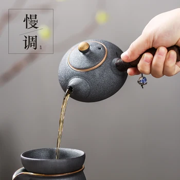 

Chinese crude pottery teapot single wooden handle Japanese style black coarse pottery tea making device handmade kung fu tea set