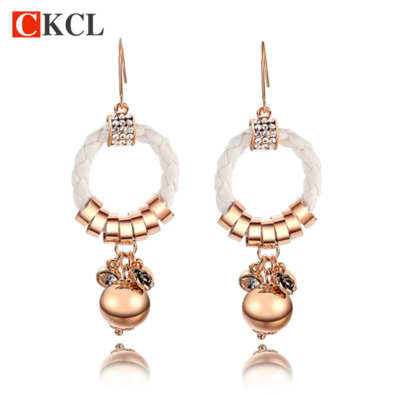 neonatal exaggerated fashion statement earrings braided leather cord