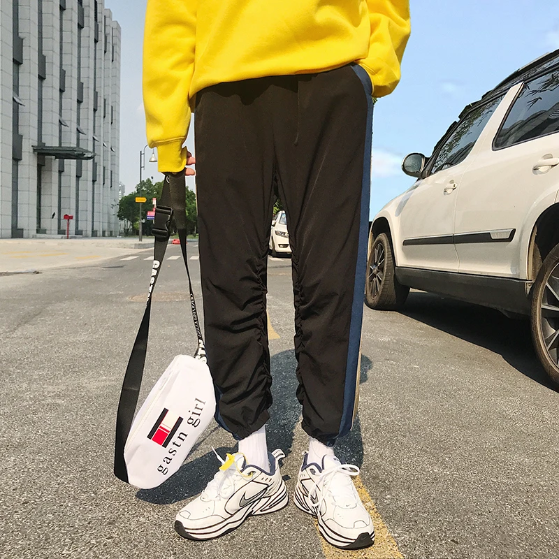 Fashion Casual Men's Pants Pants Spring And Autumn New M-2XL Stripes Loose Harem Pants Black Gray Personality Youth Popular Fashion Casual Men's Pants Pants Spring And Autumn New M-2XL Stripes Loose Harem Pants Black Gray Personality Youth Popular