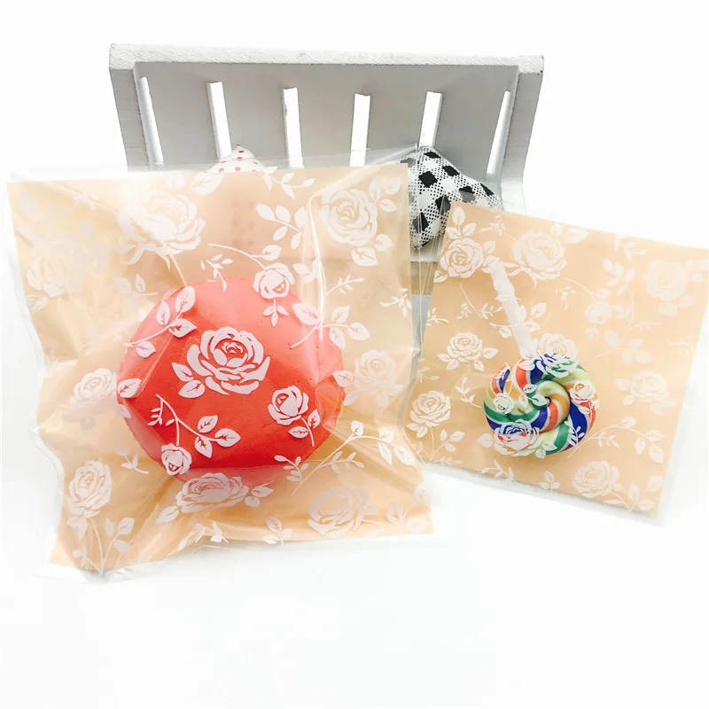 

2 sizes 100pcs Rose Plastic Cookie Bags Wedding Cookie Bag Cake Candy Macaron Packaging Bag Party Decoration