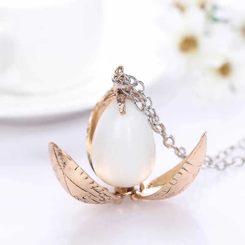 

10 Pcs/lot Harri Potter Goblet Of Fire Rotation Activity Fire Dragon Egg Necklace Pendant toy gifts