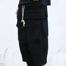 Европа и Соединенные Штаты Весна и лето тонкий участок низкой промежности брюки с несколькими карманами поддельные две части черный trousers27-40