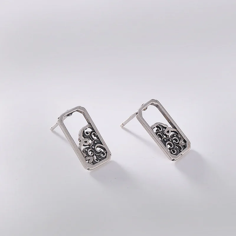 

S925 pure silver restoring ancient ways personality hollow out wavy grain pattern the joker ms stud earrings earrings
