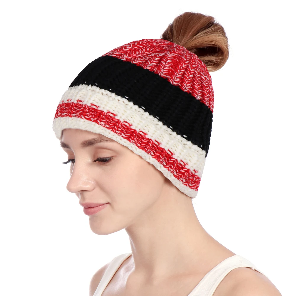beanie hat with large pom pom