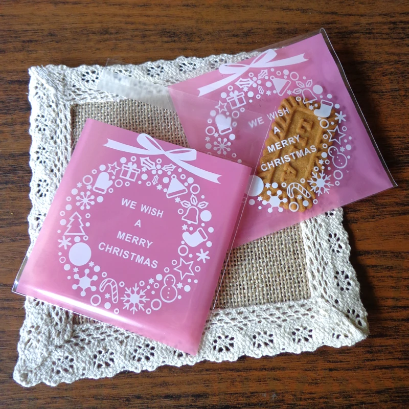 

100pcs Merry Christmas Garland Plastic Gift Bag Pink Self Seal Cellophane Bag Cute Cookies Biscuit Cake Plastic Party Cake Bag