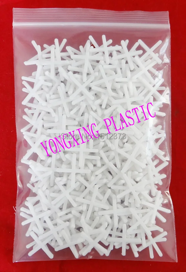 

300pcs/bag plastic cross/ tice spacer 1.5 white color locate the ceramic tile