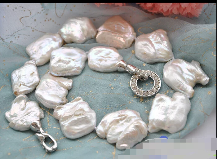 

Free Shipping ***Hot sale >>HUGE 18" 33mm WHITE BAROQUE KESHI REBORN PEARL NECKLACE
