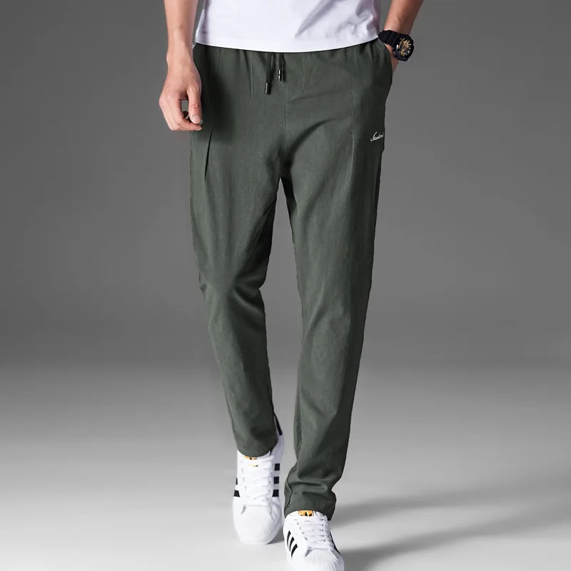 2019 new men's pants youth solid color cotton and linen casual pants male Korean version of the slim feet pants trend 5 colors