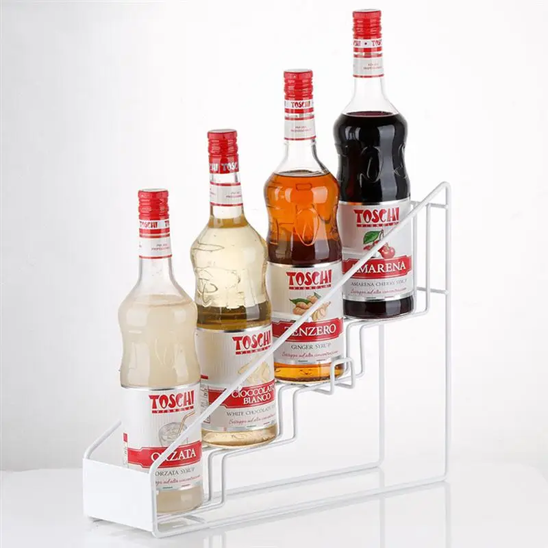 полка для бутылок с сиропом. вкусный продукт сироп. где хранить сиропы. полки для вина винотека винный шкаф. натуральный сироп.