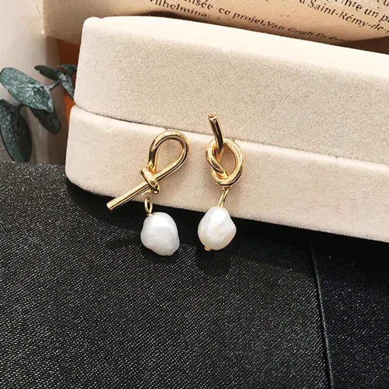 

Knotted asymmetric pearl earrings Female Simplicity Temperament Korea 2019 New Tide Earrings ear jewelry mesh red