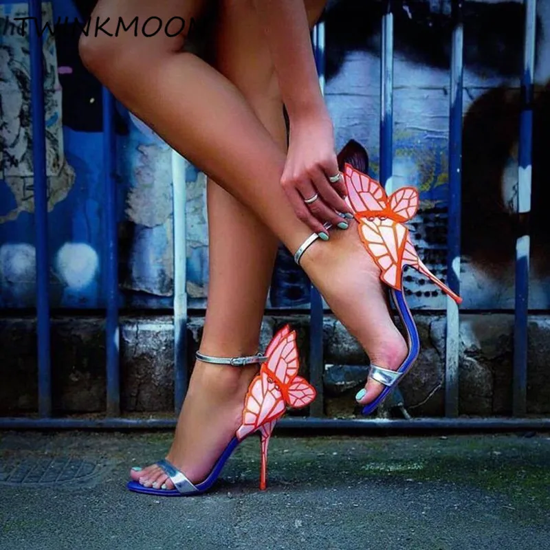 Cena Skrzydło motyla projektant sandały damskie Mirrow metalowe haftowane buty na wysokim obcasie z paskiem na kostce buty Glitter Woman sandały gladiatorki