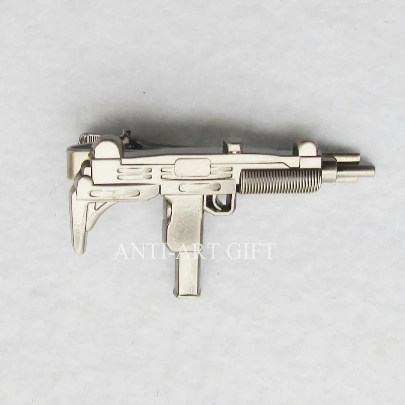 

Customized die struck gun shape tie clip
